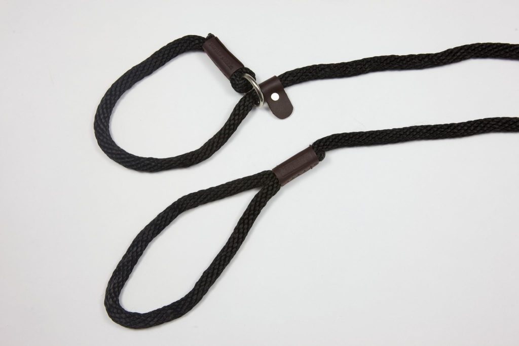 Black braided rope with leather fittings.